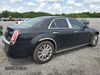 2012 Chrysler 300 C with VIN 2C3CCAKTXCH151465, listed as a Copart auction lot 65820264 with 132,609 mi miles and Salvage Title. Bid and sale history available at DreamBid. Image 3.