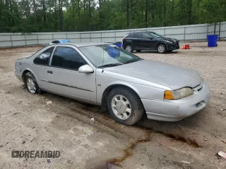 1995 Ford Thunderbird LX z VIN 1FALP62W7SH169522, wystawiony jako Copart lot #58637765 z przebiegiem 136 505 mil mil oraz Czysty tytuł • Clean title. Historia ofert i sprzedaży dostępna na DreamBid. Obrazek 4.