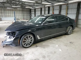 2019 BMW 7 Series 740i z VIN WBA7E2C57KB454012, wystawiony jako Copart lot #50977775 z przebiegiem Nie podano mil oraz Szkoda całkowita • Salvage title. Historia ofert i sprzedaży dostępna na DreamBid. Obrazek 1.