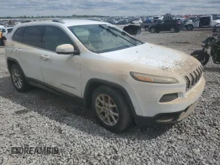 2015 Jeep Cherokee Latitude with VIN 1C4PJLCB9FW506880, listed as a Copart auction lot 54125765 with Not Provided miles and Salvage Title. Bid and sale history available at DreamBid. Image 4.