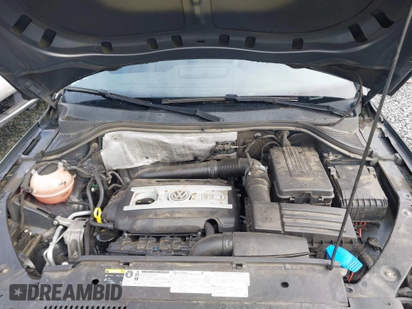 2016 Volkswagen Tiguan SE with VIN WVGBV7AX5GW511804, listed as a IAAI auction lot 41817295 with 75,831 mi miles and . Bid and sale history available at DreamBid. Image 10.