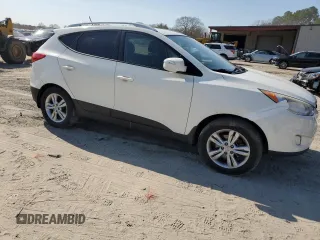 2013 Hyundai Tucson GLS with VIN KM8JU3AC1DU606047, listed as a Copart auction lot 48692885 with 185,829 mi miles and Salvage Title. Bid and sale history available at carsss.com. Image 4.