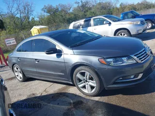 2014 Volkswagen CC R-Line with VIN WVWBN7AN1EE518173, listed as a IAAI auction lot 40895187 with 133,960 mi miles. Bid and sale history available at carsss.com. Image 13.
