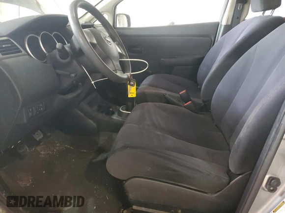 2009 Nissan Versa S with VIN 3N1BC13E59L499698, listed as a Copart auction lot 58242235 with 169,239 mi miles and Clean title. Bid and sale history available at DreamBid. Image 7.