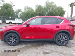 2018 Mazda CX-5 Grand Touring with VIN JM3KFADMXJ0302656, listed as a IAAI auction lot 42099173 with 125,378 mi miles and . Bid and sale history available at DreamBid. Image 14.