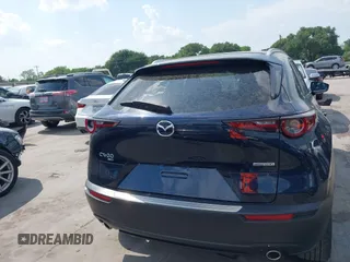 2023 Mazda CX-30 S Carbon Edition with VIN 3MVDMBCM4PM542160, listed as a IAAI auction lot 42175395 with 11,340 mi miles and . Bid and sale history available at DreamBid. Image 16.