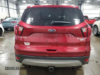 2019 Ford Escape Titanium with VIN 1FMCU9J9XKUA41715, listed as a Copart auction lot 57483725 with 30,644 mi miles and Salvage title. Bid and sale history available at DreamBid. Image 6.