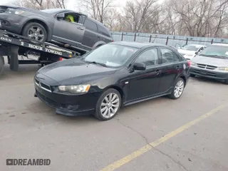2010 Mitsubishi Lancer GTS with VIN JA32X8HWXAU004111, listed as a IAAI auction lot 41563303 with 198,931 mi miles. Bid and sale history available at carsss.com. Image 2.