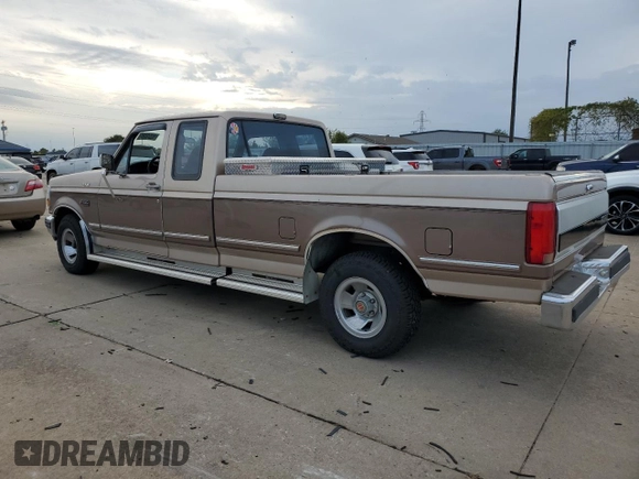 1992 Ford F-150 with VIN 1FTEX15H2NKA46074, listed as a Copart auction lot 79233364 with 188,545 mi miles and Salvage Title. Bid and sale history available at carsss.com. Image 2.