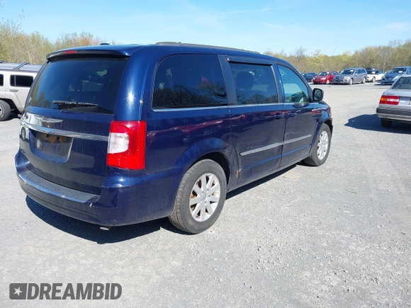 2014 Chrysler Town & Country Touring with VIN 2C4RC1BG5ER365110, listed as a IAAI auction lot 42138323 with 127,424 mi miles. Bid and sale history available at carsss.com. Image 4.