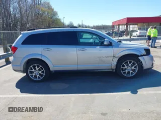2014 Dodge Journey SXT z VIN 3C4PDCBG7ET227470, wystawiony jako IAAI lot #41843128 z przebiegiem 98 195 mil mil oraz . Historia ofert i sprzedaży dostępna na DreamBid. Obrazek 13.