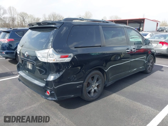 2015 Toyota Sienna SE with VIN 5TDXK3DC3FS534713, listed as a IAAI auction lot 41813651 with 200,030 mi miles and . Bid and sale history available at DreamBid. Image 4.