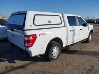 2023 Ford F-150 XL with VIN 1FTFW1E53PKE90953, listed as a IAAI auction lot 40830631 with 33,558 mi miles and . Bid and sale history available at DreamBid. Image 4.