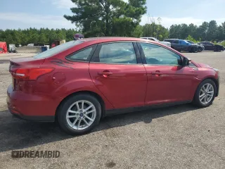 2015 Ford Focus SE with VIN 1FADP3F24FL311323, listed as a Copart auction lot 62958995 with 140,097 mi miles and Clean title. Bid and sale history available at DreamBid. Image 3.