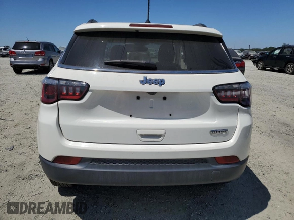 2018 Jeep Compass Latitude z VIN 3C4NJCBB8JT495295, wystawiony jako Copart lot #61054315 z przebiegiem 50 324 mil mil oraz Szkoda całkowita • Salvage title. Historia ofert i sprzedaży dostępna na DreamBid. Obrazek 6.