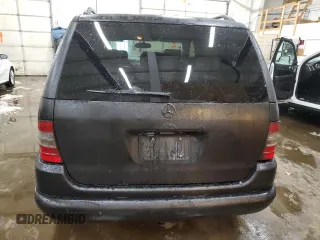 1999 Mercedes-Benz M-Class with VIN 4JGAB54E3XA101177, listed as a Copart auction lot 78703184 with 236,957 mi miles and Salvage Title. Bid and sale history available at carsss.com. Image 6.