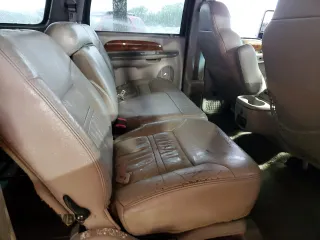 2000 Ford Excursion Limited with VIN 1FMNU43SXYEA13878, listed as a Copart auction lot 54050075 with 194,329 mi miles and Salvage title. Bid and sale history available at DreamBid. Image 10.