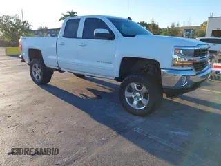 2017 Chevrolet Silverado 1500 LT with VIN 1GCVKREC7HZ216507, listed as a IAAI auction lot 41828407 with 138,294 mi miles. Bid and sale history available at carsss.com. Image 1.