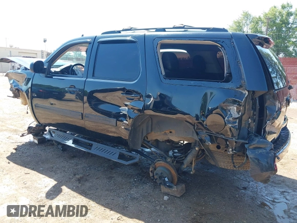 2013 Chevrolet Tahoe LS with VIN 1GNSCAE06DR263469, listed as a IAAI auction lot 42245636 with 240,506 mi miles and . Bid and sale history available at DreamBid. Image 3.