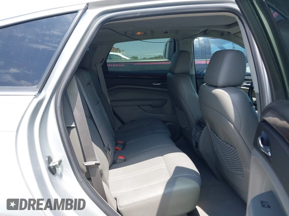 2011 Cadillac SRX Premium Collection with VIN 3GYFNCEY2BS594415, listed as a IAAI auction lot 42042854 with 130,894 mi miles and . Bid and sale history available at DreamBid. Image 8.