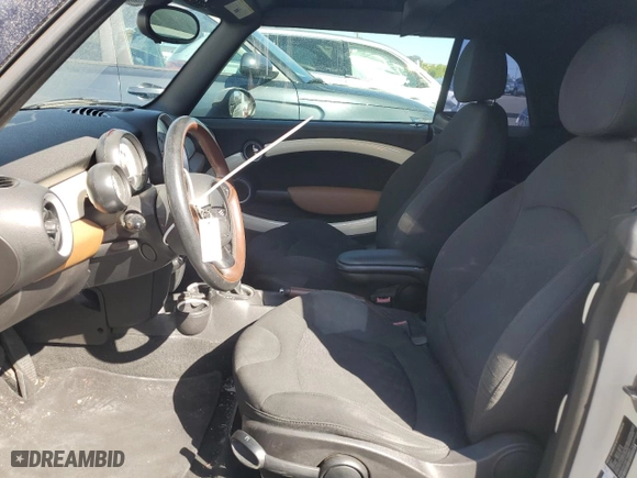 2014 MINI Cooper Convertible with VIN WMWZN3C59ET569823, listed as a Copart auction lot 72543194 with 56,730 mi miles and Salvage Title. Bid and sale history available at carsss.com. Image 7.
