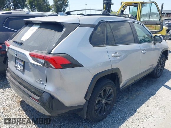 2022 Toyota RAV4 Hybrid SE z VIN 4T3T6RFV9NU070229, wystawiony jako IAAI lot #42565070 z przebiegiem 21 901 mil mil oraz . Historia ofert i sprzedaży dostępna na DreamBid. Obrazek 4.