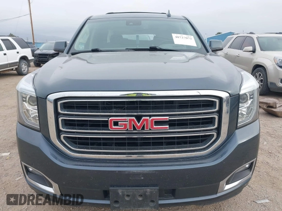 2019 GMC Yukon XL SLT with VIN 1GKS2GKC0KR345860, listed as a IAAI auction lot 40727072 with 127,568 mi miles and . Bid and sale history available at carsss.com. Image 13.