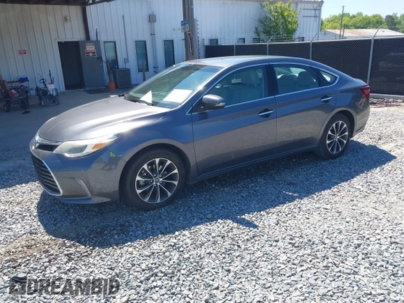 2016 Toyota Avalon Limited with VIN 4T1BK1EB4GU208979, listed as a IAAI auction lot 42032374 with 242,738 mi miles and . Bid and sale history available at carsss.com. Image 2.