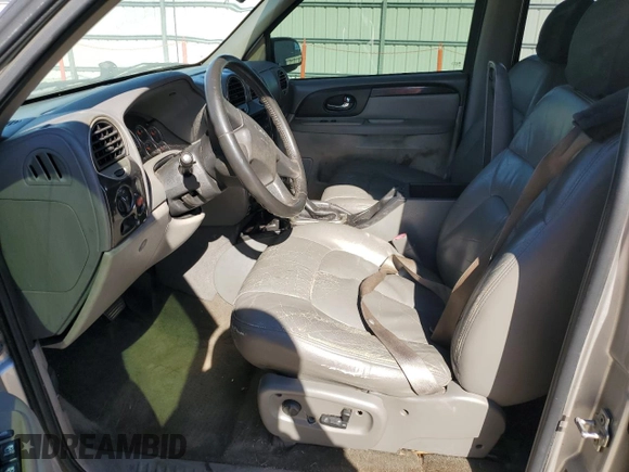 2004 GMC Envoy SLE with VIN 1GKDS13SX42374385, listed as a Copart auction lot 50150065 with 0 mi miles and Salvage Title. Bid and sale history available at carsss.com. Image 7.