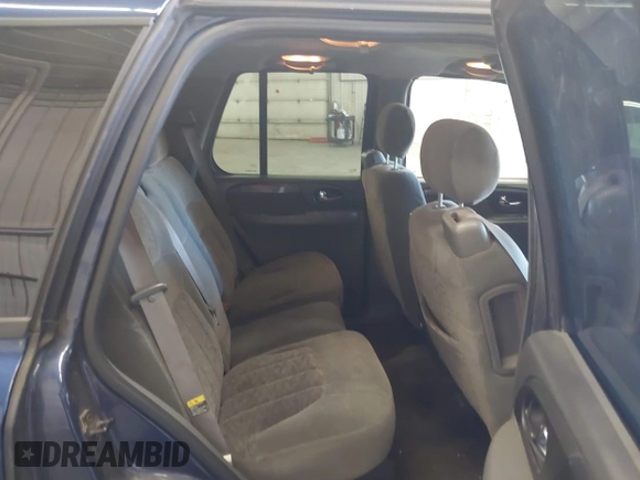 2003 GMC Envoy SLE with VIN 1GKDT13SX32365522, listed as a IAAI auction lot 42655399 with 210,765 mi miles and . Bid and sale history available at DreamBid. Image 8.