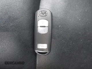 2015 Mazda 3 i Grand Touring with VIN JM1BM1M71F1235780, listed as a IAAI auction lot 42022521 with 140,038 mi miles and . Bid and sale history available at DreamBid. Image 11.