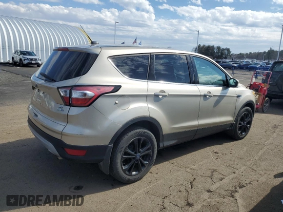 2017 Ford Escape SE with VIN 1FMCU9GD6HUC98469, listed as a Copart auction lot 46215105 with 143,119 mi miles and Clean Title. Bid and sale history available at DreamBid. Image 3.
