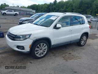 2012 Volkswagen Tiguan S with VIN WVGAV7AX0CW566151, listed as a IAAI auction lot 42826985 with 121,185 mi miles and . Bid and sale history available at DreamBid. Image 2.