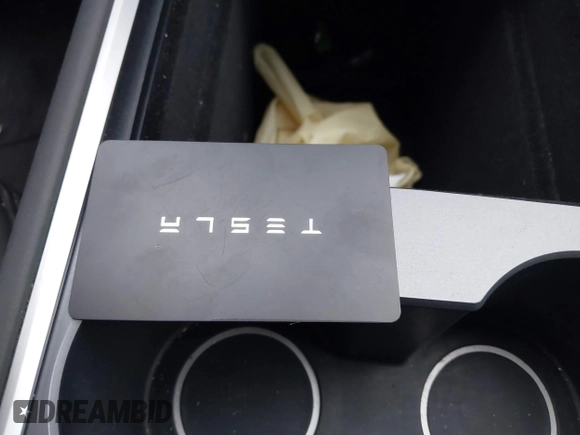 2023 Tesla Model Y Long Range z VIN 7SAYGDEE5PA063097, wystawiony jako IAAI lot #42171871 z przebiegiem Nie podano mil oraz . Historia ofert i sprzedaży dostępna na DreamBid. Obrazek 11.