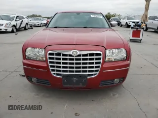 2010 Chrysler 300 Touring with VIN 2C3CA5CV8AH154245, listed as a Copart auction lot 71257774 with 121,489 mi miles and Salvage Title. Bid and sale history available at carsss.com. Image 5.