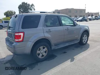 2008 Ford Escape Hybrid with VIN 1FMCU49H78KE79028, listed as a IAAI auction lot 42142396 with 131,642 mi miles and . Bid and sale history available at DreamBid. Image 4.