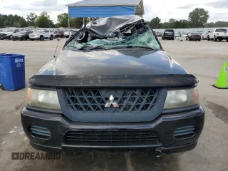 2002 Mitsubishi Montero ES z VIN JA4LS21H02J022594, wystawiony jako Copart lot #72750954 z przebiegiem 122 232 mil mil oraz Szkody całkowita. Historia ofert i sprzedaży dostępna na DreamBid. Obrazek 5.