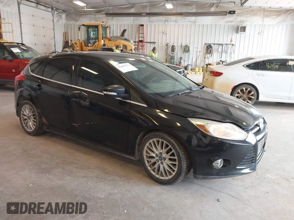 2012 Ford Focus SEL with VIN 1FAHP3M24CL331586, listed as a IAAI auction lot 42086129 with 193,060 mi miles. Bid and sale history available at carsss.com. Image 1.