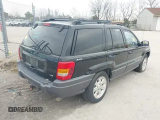 2001 Jeep Grand Cherokee Laredo with VIN 1J4GW48N91C644952, listed as a IAAI auction lot 40825099 with Not provided miles and . Bid and sale history available at DreamBid. Image 4.