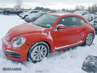 2017 Volkswagen Beetle 1.8T SE with VIN 3VWJ17AT3HM624934, listed as a IAAI auction lot 41389551 with 29,109 mi miles. Bid and sale history available at carsss.com. Image 2.
