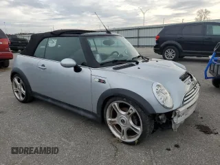 2005 MINI Convertible S with VIN WMWRH33575TK56034, listed as a Copart auction lot 88043565 with 33,410 mi miles and Salvage title. Bid and sale history available at DreamBid. Image 4.