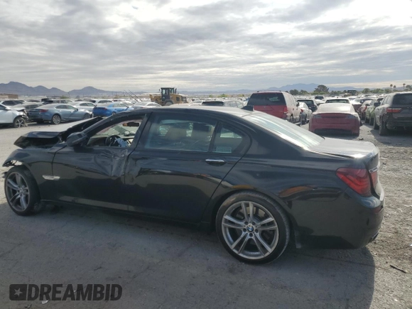 2015 BMW 7 Series 750Li with VIN WBAYE8C59FD781223, listed as a Copart auction lot 54944265 with 125,203 mi miles and Salvage title. Bid and sale history available at DreamBid. Image 2.