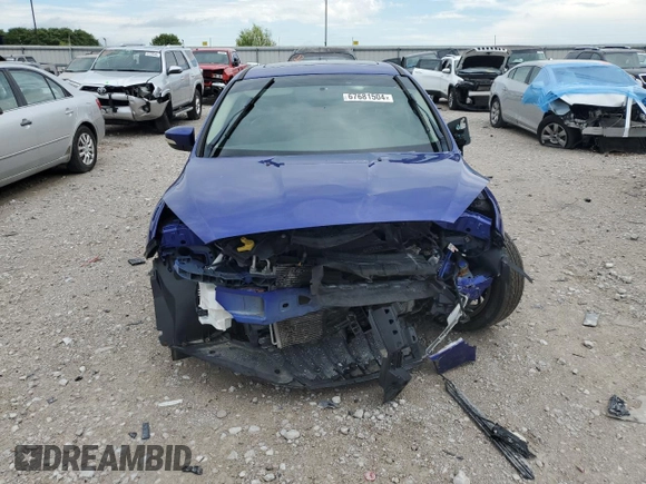 2015 Ford Focus Titanium z VIN 1FADP3J20FL299209, wystawiony jako Copart lot #67681504 z przebiegiem 98 711 mil mil oraz Nie do naprawy • Non repairable. Historia ofert i sprzedaży dostępna na DreamBid. Obrazek 5.