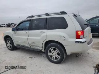 2004 Mitsubishi Endeavor XLS with VIN 4A4MM31S14E056988, listed as a Copart auction lot 84604114 with 153,434 mi miles and Salvage Title. Bid and sale history available at carsss.com. Image 2.