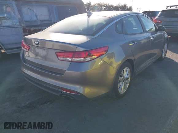 2018 Kia Optima LX with VIN 5XXGT4L32JG256921, listed as a IAAI auction lot 41389850 with 91,013 mi miles and . Bid and sale history available at DreamBid. Image 4.