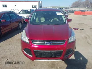 2014 Ford Escape Titanium with VIN 1FMCU9J98EUC24857, listed as a IAAI auction lot 41973037 with 160,634 mi miles. Bid and sale history available at carsss.com. Image 13.
