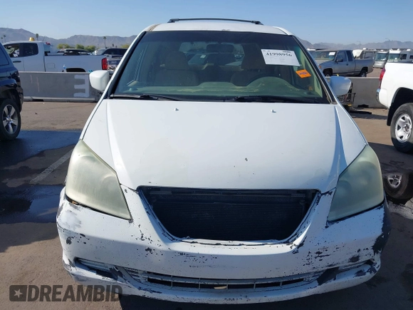 2005 Honda Odyssey EX with VIN 5FNRL38465B081716, listed as a IAAI auction lot 41998956 with 173,182 mi miles and . Bid and sale history available at carsss.com. Image 6.