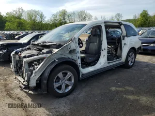 2018 Honda Odyssey EX-L z VIN 5FNRL6H74JB047697, wystawiony jako Copart lot #56700955 z przebiegiem Nie podano mil oraz Szkody całkowita. Historia ofert i sprzedaży dostępna na DreamBid. Obrazek 1.