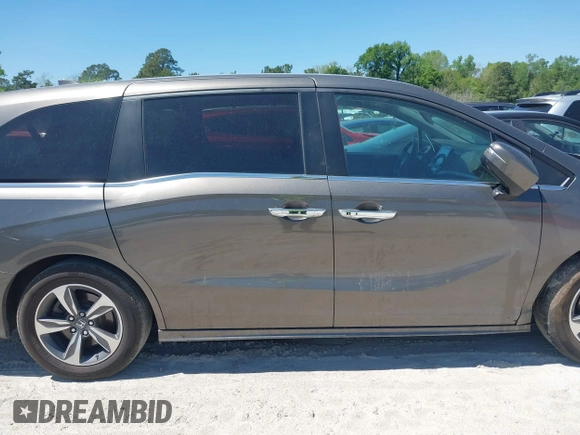 2020 Honda Odyssey Touring with VIN 5FNRL6H87LB002202, listed as a IAAI auction lot 42015741 with 182,051 mi miles and . Bid and sale history available at DreamBid. Image 13.
