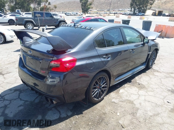2016 Subaru WRX STI with VIN JF1VA2M65G9824049, listed as a IAAI auction lot 42517527 with 117,883 mi miles and . Bid and sale history available at DreamBid. Image 4.
